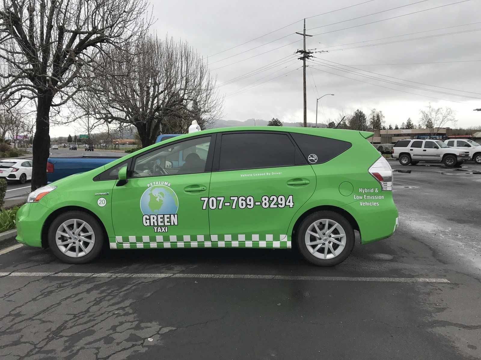 Green Taxi Vehicle Graphics by Sign Dynamics