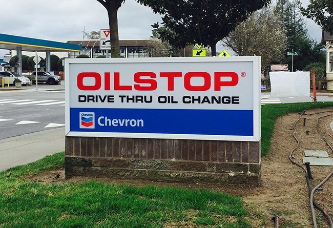 Oil Stop illuminated lightbox sign by Sign Dynamics