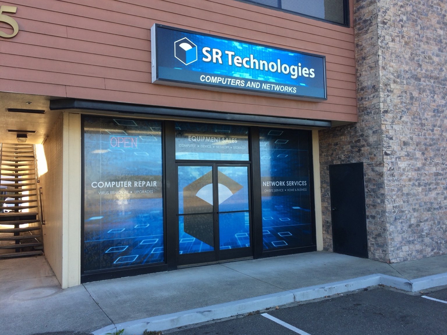 Storefront & Building Signs project by Sign Dynamics